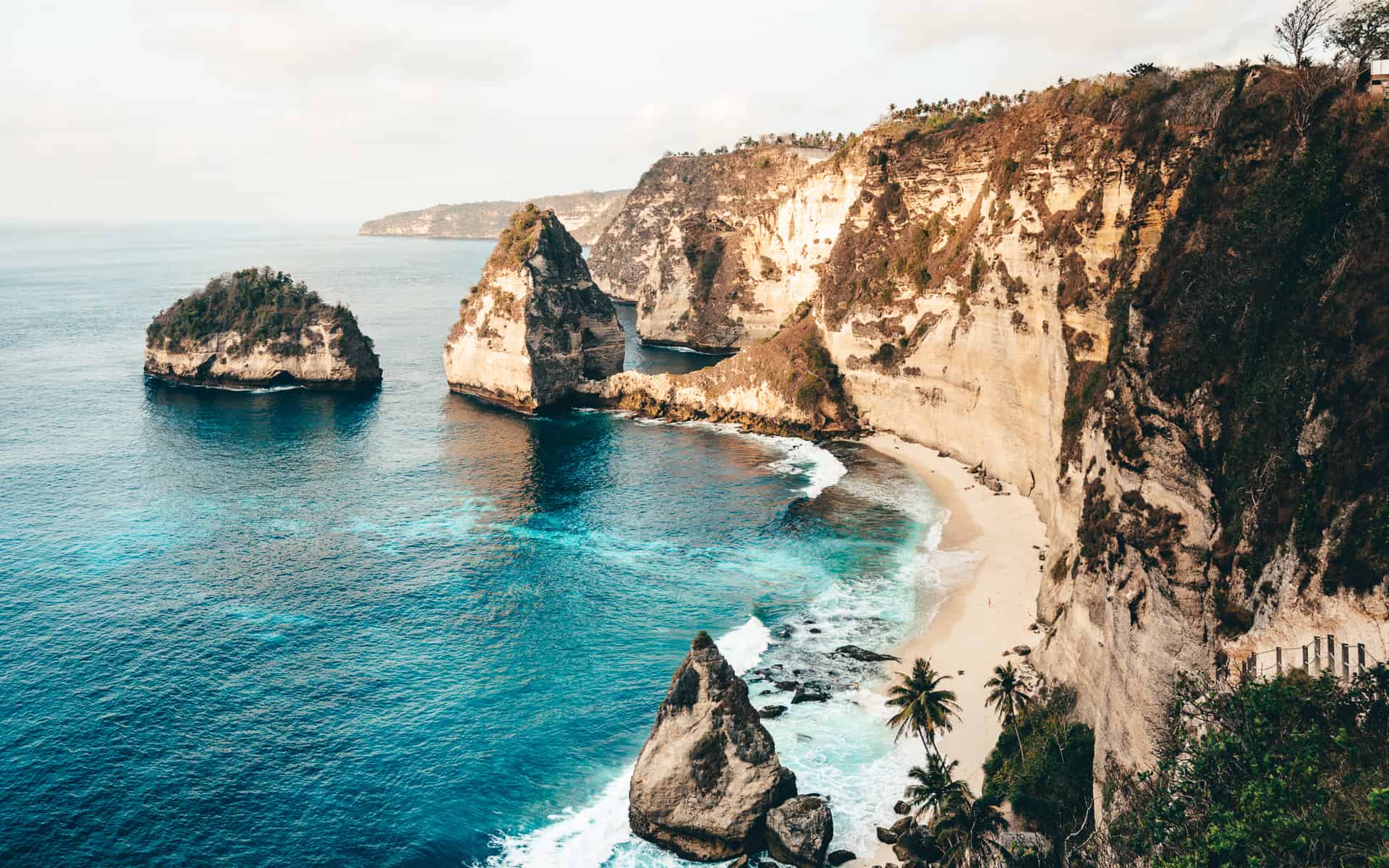 Diamond Beach and the surrounding rock formations in Nusa Penida